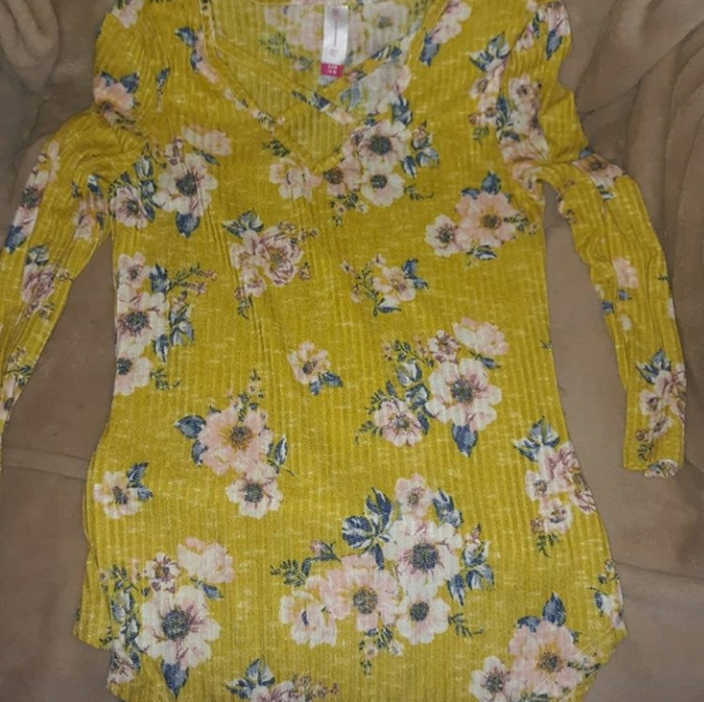 2 floral womans shirts.